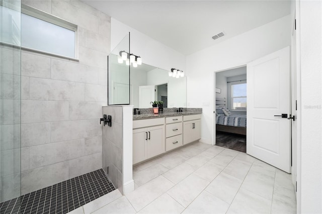 2591 Seagirt Way, Clermont, FL 34711 - ensuite bathroom featuring double vanity and walk in shower