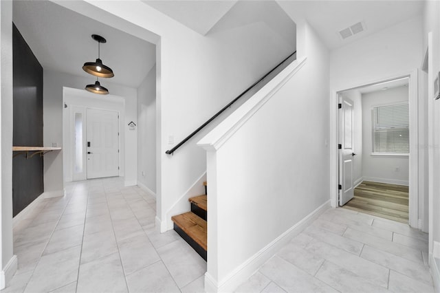 2591 Seagirt Way, Clermont, FL 34711 - entryway featuring stairway and baseboards