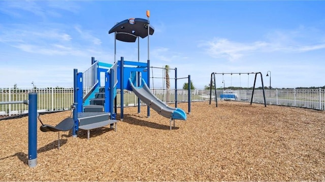 community jungle gym with fence