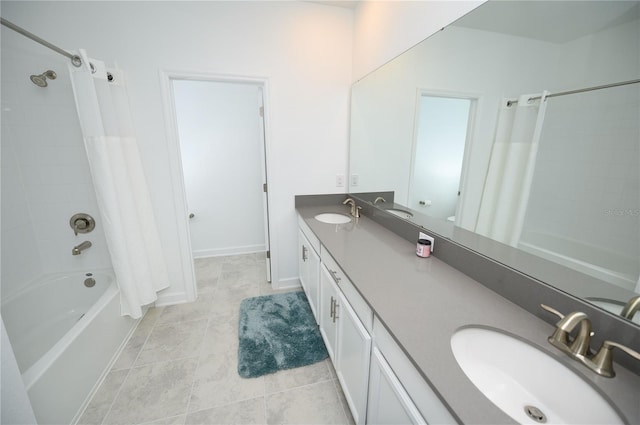 bathroom with shower / bathtub combination with curtain, double vanity, and tile patterned floors