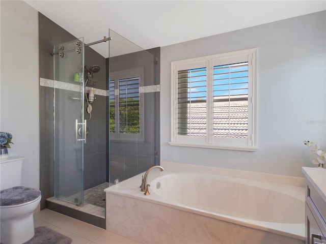7580 Colony Palm Dr, Boynton Beach, FL 33436 - bathroom with a bath, a shower stall, toilet, vanity, and tile patterned flooring