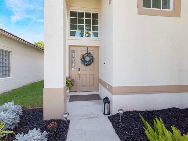 7580 Colony Palm Dr, Boynton Beach, FL 33436 - doorway to property featuring stucco siding