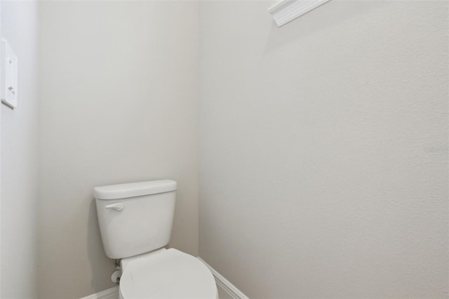16460 Silver Brook Way, Winter Garden, FL 34787 - bathroom featuring baseboards and toilet