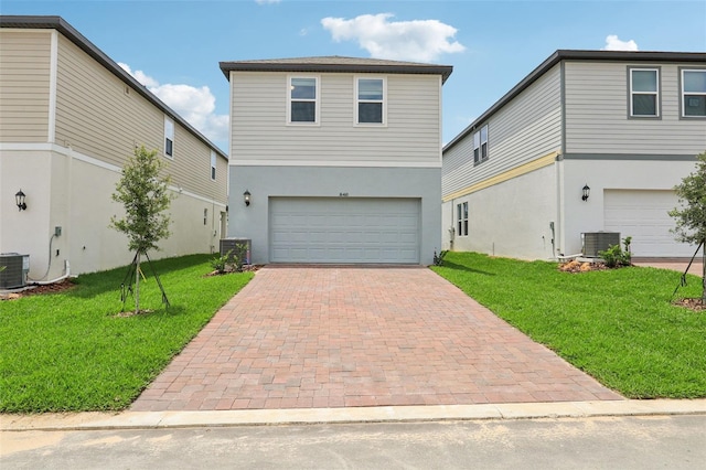 16460 Silver Brook Way, Winter Garden, FL 34787 - traditional-style house featuring central AC unit, a garage, decorative driveway, a front lawn, and stucco siding