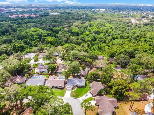 aerial view of residential area with a forest