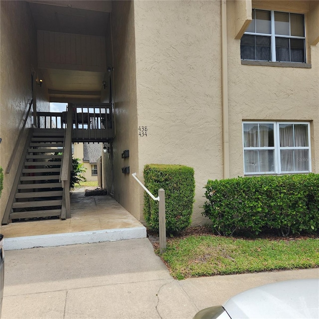 434 Windmeadows St Unit 434, Altamonte Springs, FL 32701 - doorway to property featuring stucco siding