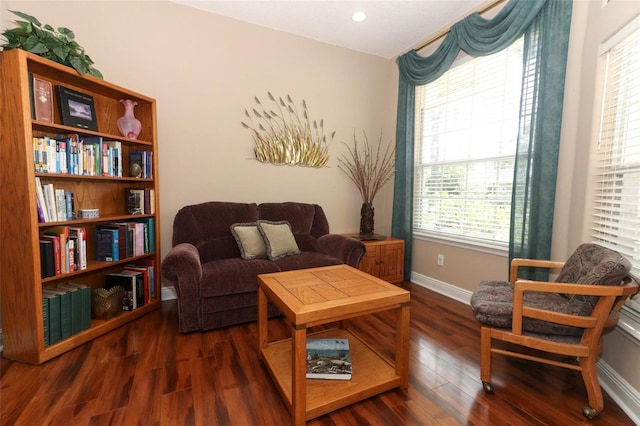 4201 Old Trafford Way, Orlando, FL 32810 - living area featuring wood finished floors and baseboards