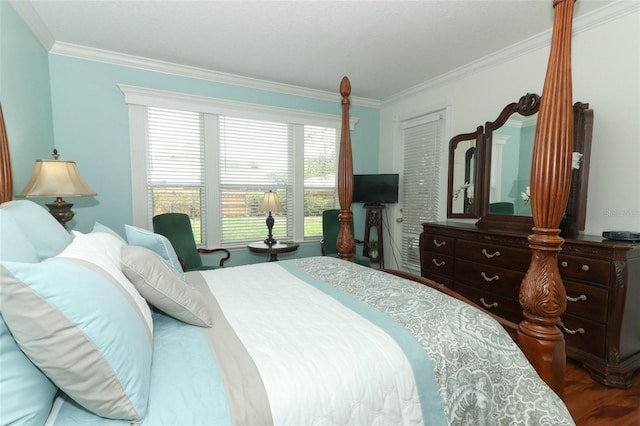 4201 Old Trafford Way, Orlando, FL 32810 - bedroom with crown molding and dark wood-type flooring