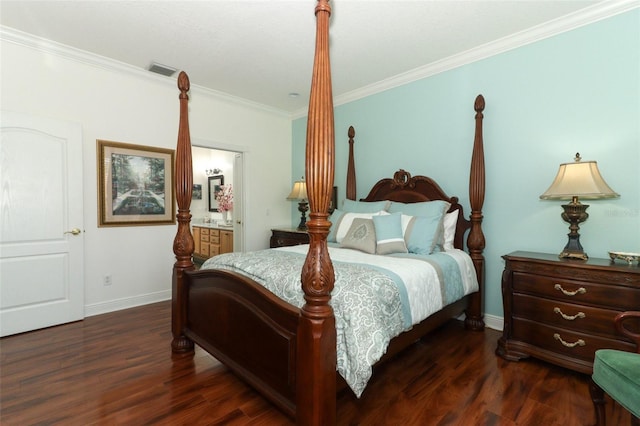 4201 Old Trafford Way, Orlando, FL 32810 - bedroom featuring crown molding, wood finished floors, baseboards, and ensuite bath