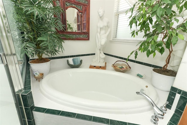 4201 Old Trafford Way, Orlando, FL 32810 - full bathroom featuring a garden tub