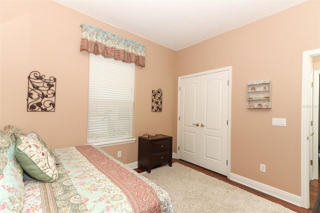 4201 Old Trafford Way, Orlando, FL 32810 - bedroom with wood finished floors and baseboards