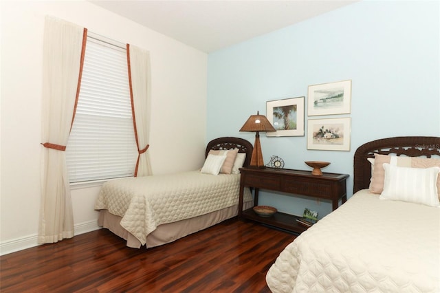 4201 Old Trafford Way, Orlando, FL 32810 - bedroom with dark wood finished floors and baseboards