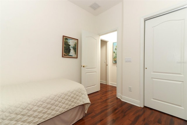 4201 Old Trafford Way, Orlando, FL 32810 - bedroom with dark wood finished floors and baseboards