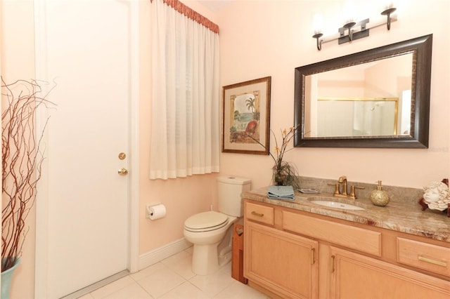 4201 Old Trafford Way, Orlando, FL 32810 - bathroom featuring tile patterned floors, toilet, vanity, a shower, and baseboards