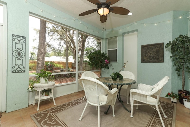 4201 Old Trafford Way, Orlando, FL 32810 - sunroom featuring a ceiling fan and outdoor dining space