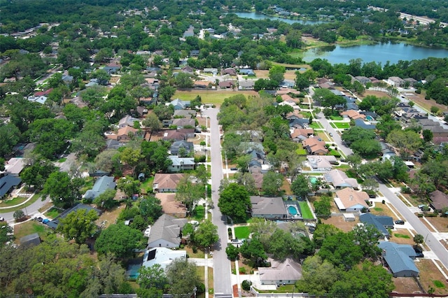 4201 Old Trafford Way, Orlando, FL 32810 - aerial overview of property's location with a large body of water and nearby suburban area