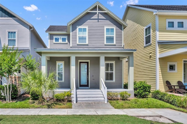 13913 Hahn Ln, Orlando, FL 32827 - view of front facade with a porch