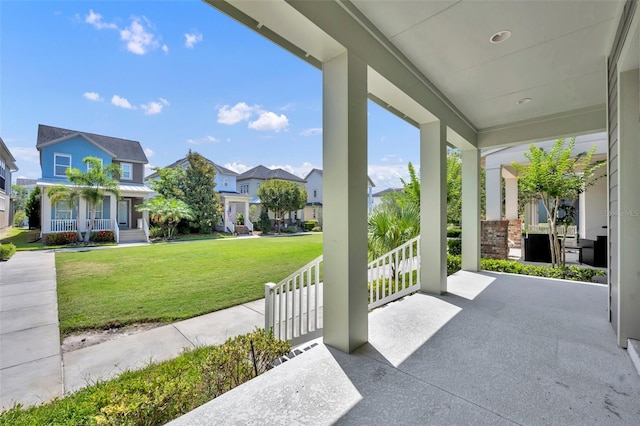 13913 Hahn Ln, Orlando, FL 32827 - view of patio featuring a porch and a residential view