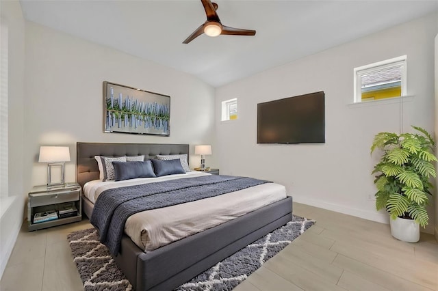 13913 Hahn Ln, Orlando, FL 32827 - bedroom with baseboards, ceiling fan, and wood finished floors