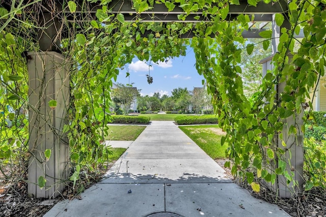 13913 Hahn Ln, Orlando, FL 32827 - view of property's community with a lawn