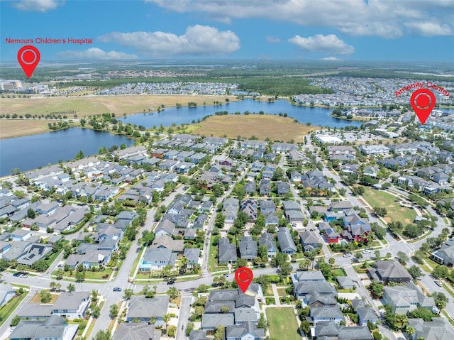 13913 Hahn Ln, Orlando, FL 32827 - aerial overview of property's location featuring a nearby body of water and nearby suburban area
