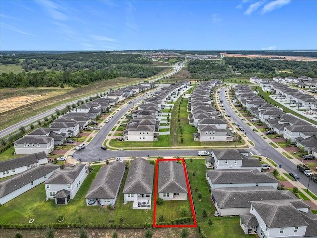 aerial view of residential area with property parcel outlined