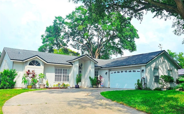 5005 Mill Stream Rd, Ocoee, FL 34761 - ranch-style house featuring asphalt driveway, a garage, and a front yard