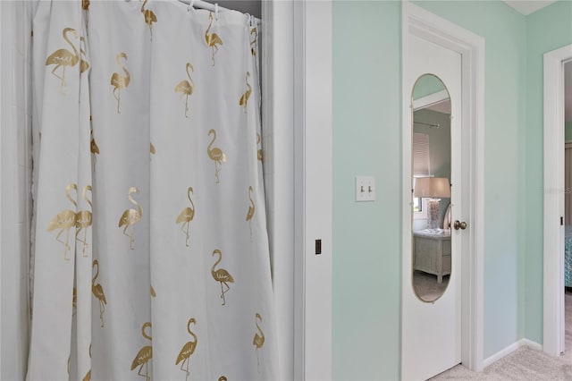 ensuite bathroom with baseboards