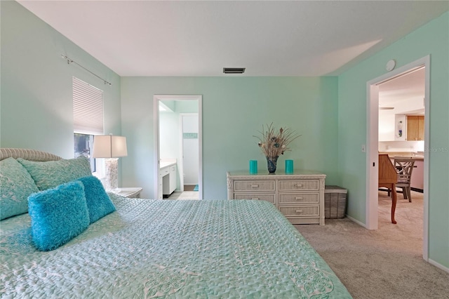 bedroom with carpet floors and baseboards