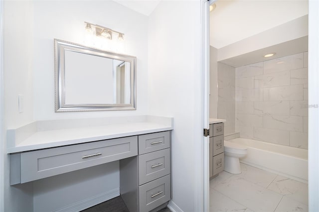 713 Coach Light Dr, Fern Park, FL 32730 - full bathroom featuring vanity, marble look tiles, toilet, and shower / washtub combination