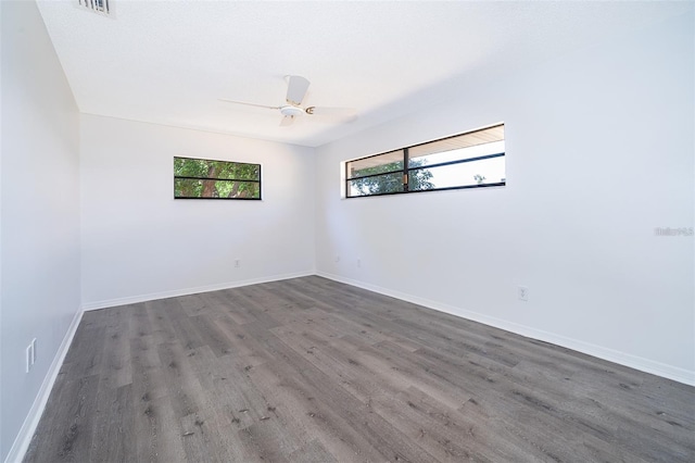 713 Coach Light Dr, Fern Park, FL 32730 - spare room featuring wood finished floors, ceiling fan, and baseboards