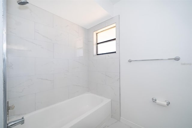 713 Coach Light Dr, Fern Park, FL 32730 - bathroom featuring marble finish flooring, shower / bath combination, and baseboards
