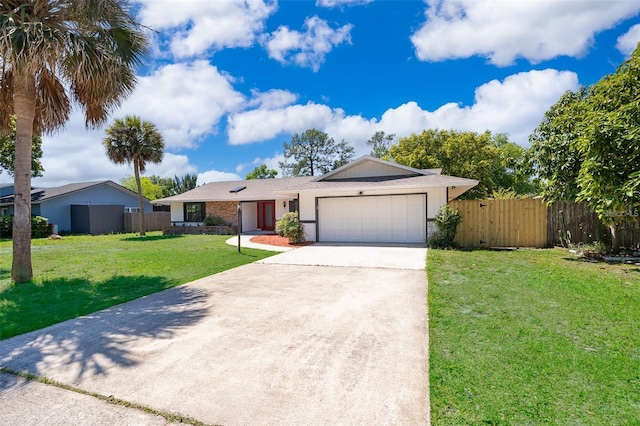 713 Coach Light Dr, Fern Park, FL 32730 - single story home with driveway and an attached garage