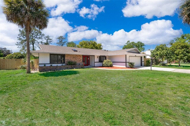 713 Coach Light Dr, Fern Park, FL 32730 - ranch-style house featuring concrete driveway and a garage