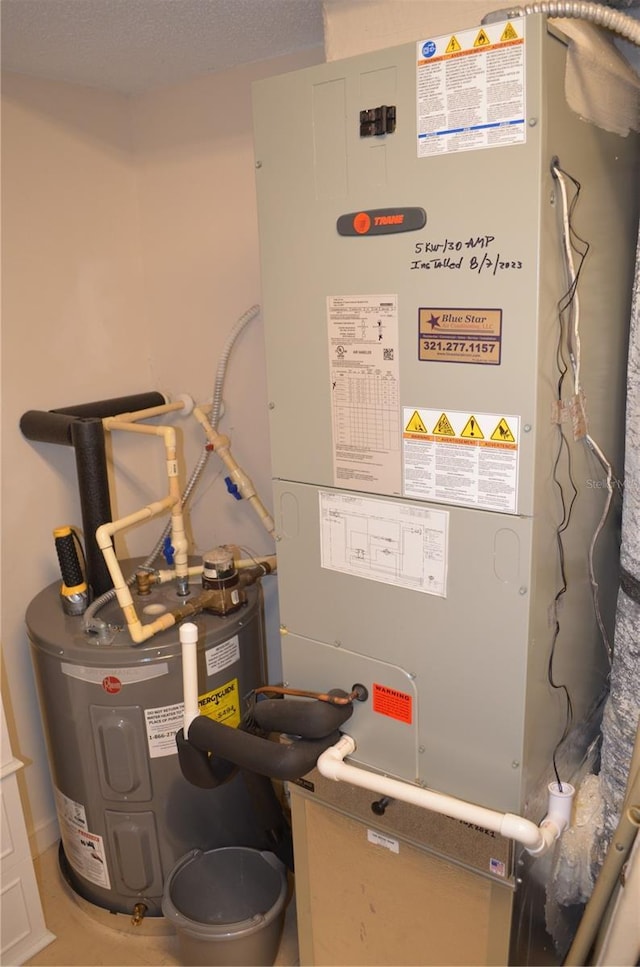 12212 Wild Iris Way Unit 106, Orlando, FL 32837 - utilities featuring electric water heater and heating unit