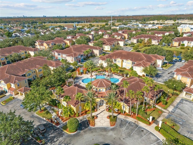 12212 Wild Iris Way Unit 106, Orlando, FL 32837 - aerial view of property's location with a pool and nearby suburban area