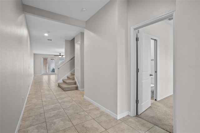 15651 Kinnow Mandarin Ln, Winter Garden, FL 34787 - hallway with light tile patterned floors, baseboards, stairs, and recessed lighting