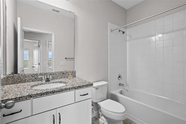 15651 Kinnow Mandarin Ln, Winter Garden, FL 34787 - bathroom featuring toilet, vanity, and shower / tub combination