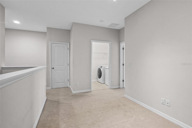 15651 Kinnow Mandarin Ln, Winter Garden, FL 34787 - corridor with washing machine and dryer, carpet floors, baseboards, and recessed lighting