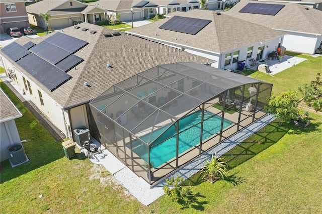 aerial perspective of suburban area with a pool