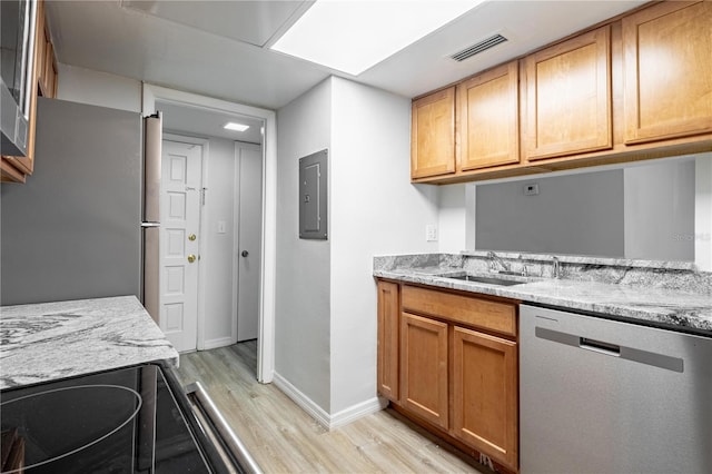 1163 Paseo Del Mar Unit B, Casselberry, FL 32707 - kitchen with appliances with stainless steel finishes, light wood-type flooring, electric panel, baseboards, and light stone countertops