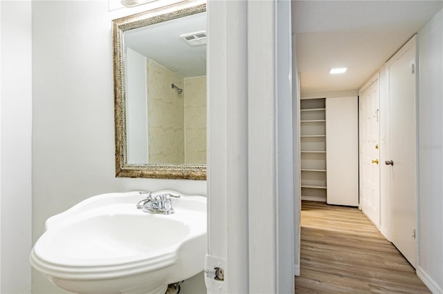 1163 Paseo Del Mar Unit B, Casselberry, FL 32707 - bathroom with wood finished floors and a sink