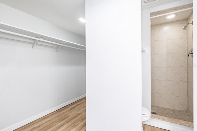 1163 Paseo Del Mar Unit B, Casselberry, FL 32707 - walk in closet featuring wood finished floors