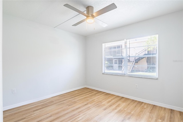 1163 Paseo Del Mar Unit B, Casselberry, FL 32707 - spare room with light wood-style floors, baseboards, and ceiling fan