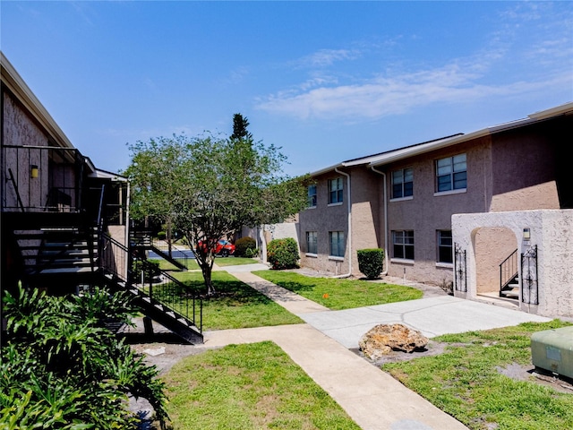 1163 Paseo Del Mar Unit B, Casselberry, FL 32707 - surrounding community featuring stairs and a yard