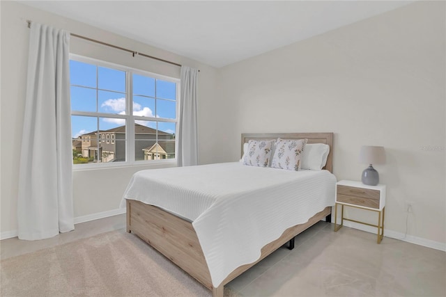 bedroom with baseboards