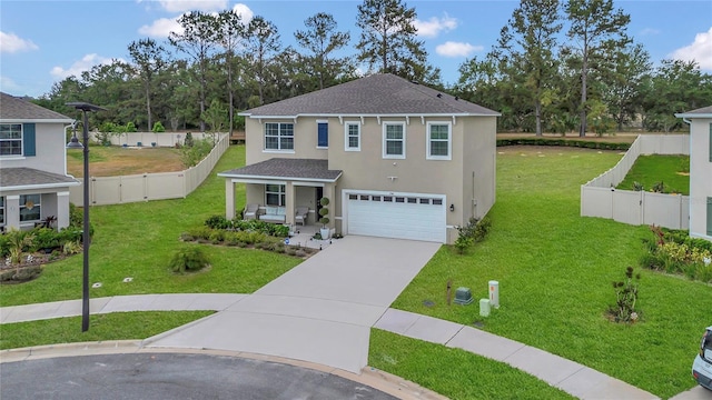 traditional-style home featuring an attached garage, stucco siding, concrete driveway, a porch, and a shingled roof