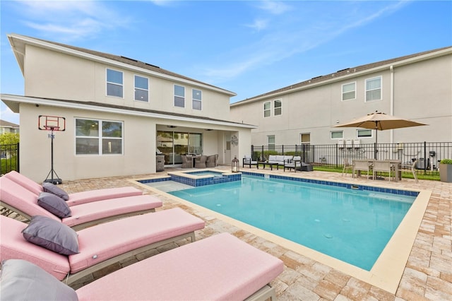 257 Auburn Ave, Kissimmee, FL 34747 - view of pool featuring a patio area, fence, and a pool with connected hot tub
