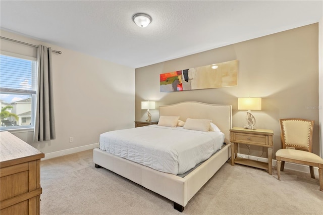 257 Auburn Ave, Kissimmee, FL 34747 - bedroom featuring light carpet and baseboards