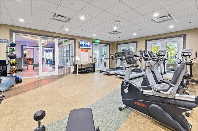 257 Auburn Ave, Kissimmee, FL 34747 - exercise room with french doors and a paneled ceiling